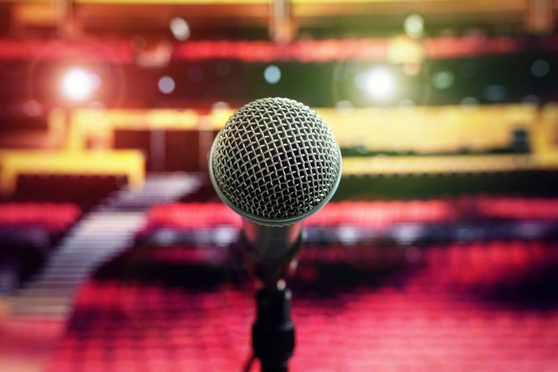 Superfly-microphone-on-stage-in-concert-hall-theater-PQ3Y669-1600